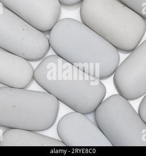 Rounded white stones Stock Photo