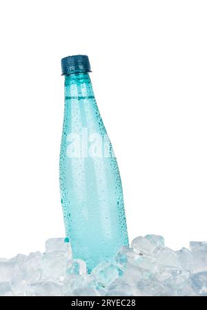 Plastic bottle of drinking water on ice over white Stock Photo