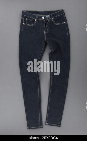 Jeans on grey background Stock Photo