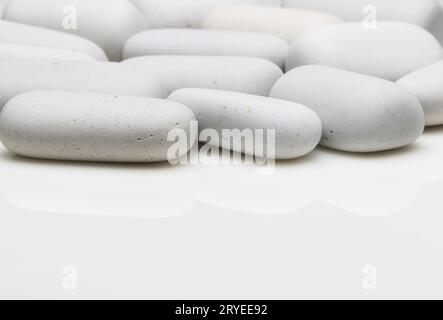 Rounded white stones Stock Photo