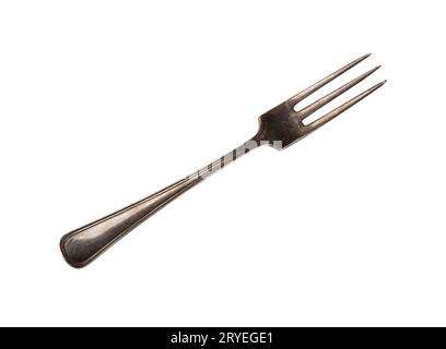 Close up one vintage metal fork isolated on white Stock Photo