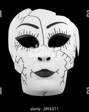 Broken Doll Face Mask Isolated On Black Stock Photo