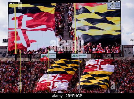 College Park, USA. 30th Sep, 2023. COLLEGE PARK, MD - SEPTEMBER 30: The Maryland State flag is lowered in the student section during a Big Ten football game between the Maryland Terrapins and the Indiana Hoosiers, on September 30, 2023, at SECU Field, in College Park, Maryland. (Photo by Tony Quinn/SipaUSA) Credit: Sipa USA/Alamy Live News Stock Photo