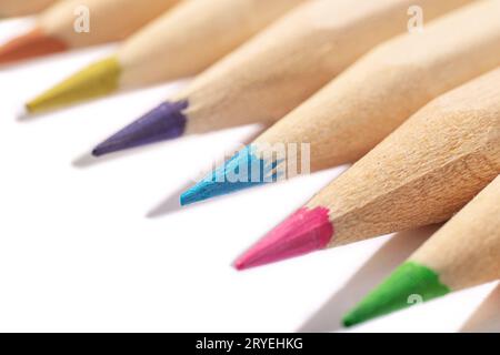 Macro shot of Wooden Colored pencils isolated on white background Stock Photo
