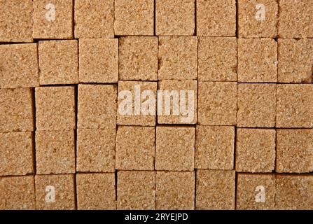 Background texture pattern of brown sugar cubes Stock Photo