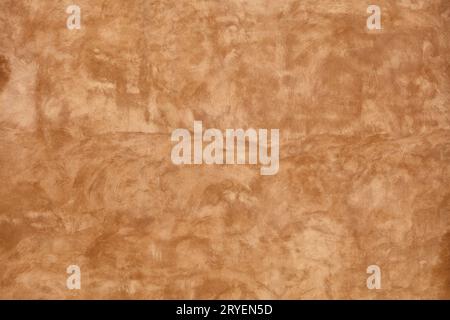 Grunge red painted plaster wall background Stock Photo