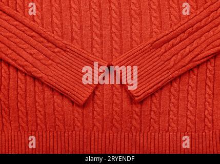 Background texture of red knitted wool fabric Stock Photo