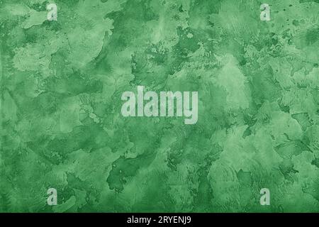 Grunge green painted plaster wall background Stock Photo
