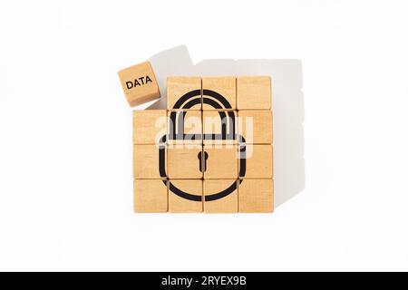 Data security concept. Wooden blocks with lock icon and data word isolated on white background Stock Photo