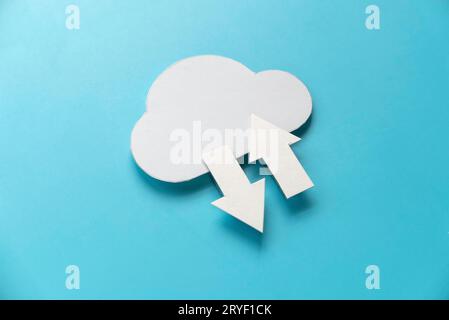 Cloud computing data storage concept.Network computing technologies. Digital server. Icon of cloud with arrow on blue background. Stock Photo