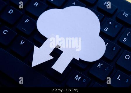 Cloud computing data storage concept.Network computing technologies. Digital server. Icon of cloud with arrow on computer keyboard. Stock Photo