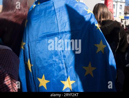 EU citizens with blue European Union flag Stock Photo