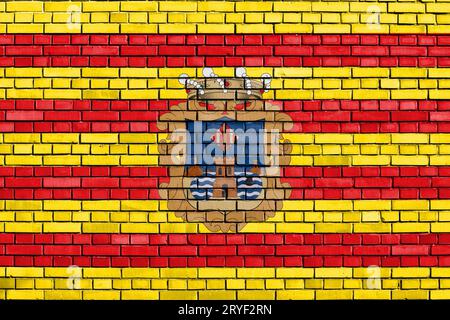Flag of Benidorm painted on brick wall Stock Photo