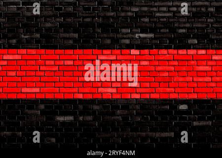 Black red colored brick wall background Stock Photo