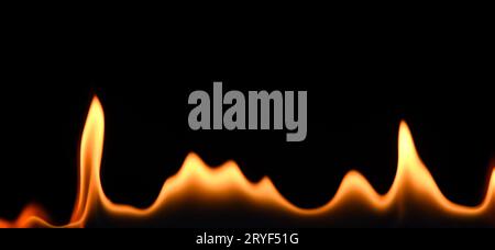 Close up fire flames isolated on black background Stock Photo