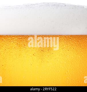 Close up background of beer with bubbles in glass Stock Photo