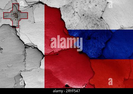 Flags of Malta and Russia painted on cracked wall Stock Photo - Alamy