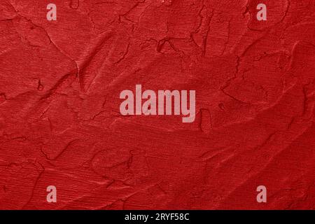 Red uneven grunge surface abstract background Stock Photo