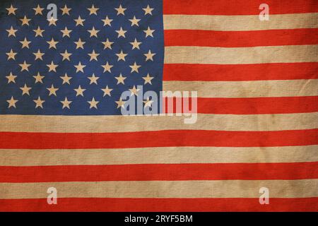Old vintage faded American US flag on canvas Stock Photo