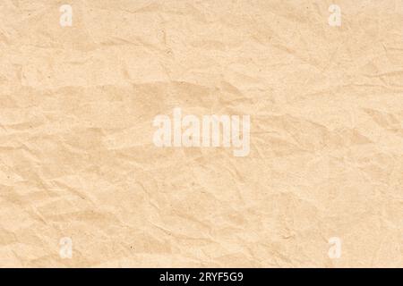 Crumpled paper texture background. Light brown color Stock Photo