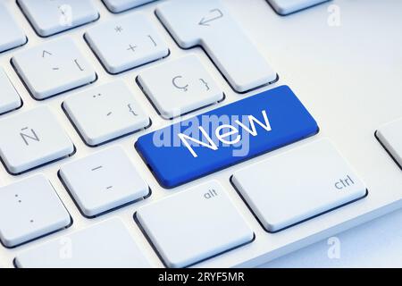 New word on blue computer Keyboard Key Stock Photo