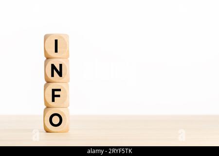 INFO text on a pile of wooden blocks on table. Copy space Stock Photo
