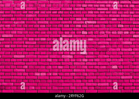 Pink colored brick wall background Stock Photo