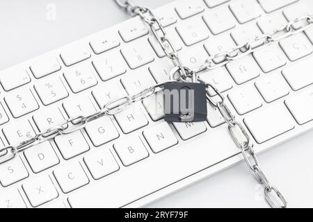 Computer Security concept. Chain and padlock on keyboard. Cyber security concept Stock Photo