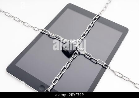 Security on digital tablet. Chain and padlock on tablet. Cyber security on digital devices concept Stock Photo