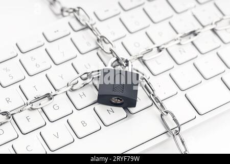 Computer Security concept. Chain and padlock on keyboard. Cyber security concept Stock Photo