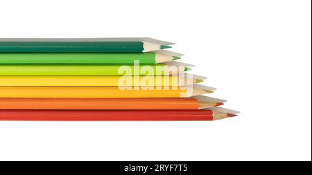 Creative Energy efficiency rating chart concept. Colorful colored pencils on white background Stock Photo