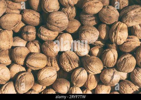 Lots of organic walnuts, filled frame. Healthy eating concept. Stock Photo