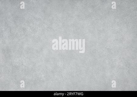 Gray textile background texture. Mesh seamless dot fabric Stock Photo
