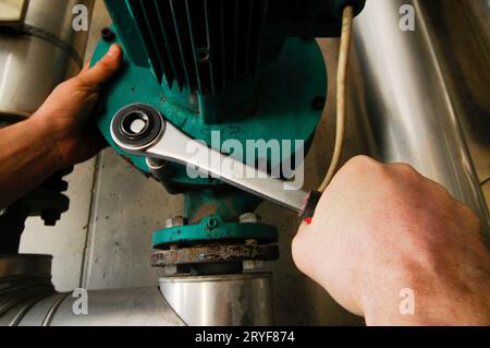 Repair of a heating system Stock Photo