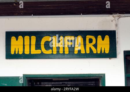 Milk farm sign in german (Milchfarm) Stock Photo