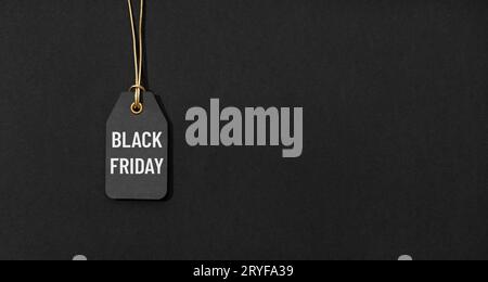 Black friday tag isolated on black background with copy space Stock Photo
