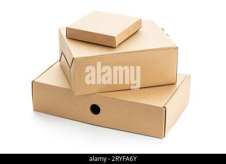 Group of stacked cardboard box isolated on white background Stock Photo