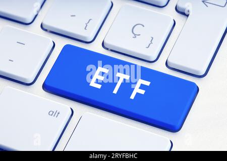 ETF Word on blue computer Keyboard Key. Close up Stock Photo