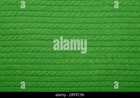 Background texture of green knitted wool fabric Stock Photo