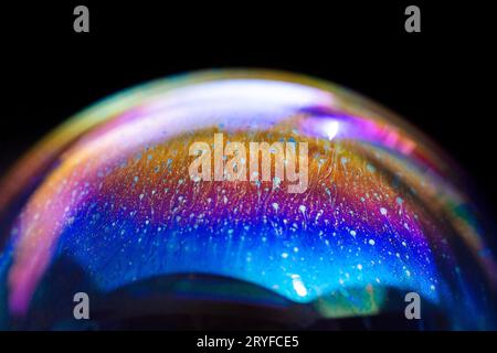 Abstract pattern, multicolored chaotic texture inside of the soap bubble, closeup Stock Photo