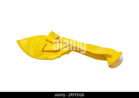 Popped balloon isolated on white background Stock Photo
