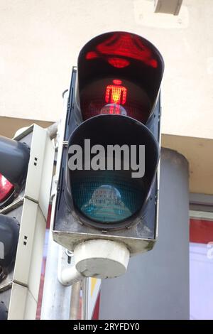 Red pedestrian traffic light on the street Stock Photo