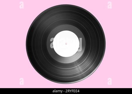 Vinyl record with bank label isolated on pink background. Mock up Stock Photo