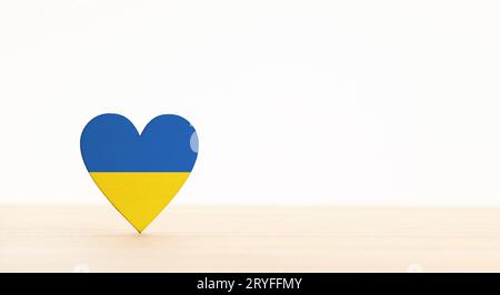 Flag of Ukraine on heart shape. White background. Copy space Stock Photo