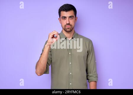 serious handsome man showing letter Y y with fingers .the Alphabet in ...