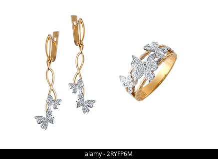 Closeup shot of the gold earrings and ring with diamond butterflies isolated on the white background Stock Photo