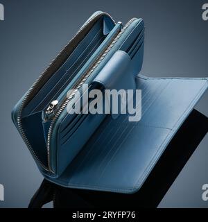 Closeup of a fashionable leather wallet on a dark background Stock Photo
