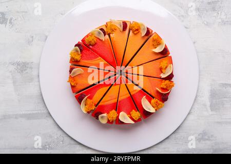 Top view shot of sliced cakes on a white plate Stock Photo