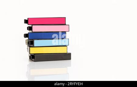 Colorful Injet printer cartridges isolated on white background. Copy space Stock Photo