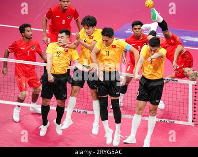 Jinhua, China's Zhejiang Province. 1st Oct, 2023. Team Vietnam block the net during the Men's Quadrant Preliminary Group match of Sepaktakraw between Indonesia and Vietnam at the 19th Asian Games in Jinhua, east China's Zhejiang Province, Oct. 1, 2023. Credit: Chen Zhonghao/Xinhua/Alamy Live News Stock Photo